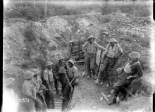 Men of the Maori Pioneer Battalion take a break in a trench near Gommecourt. 25 July 1918.